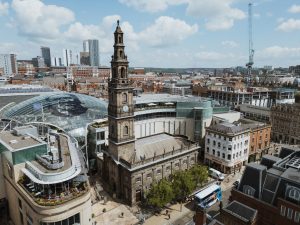 Holy trinity church exterior from above with trinity in background. venues own website image